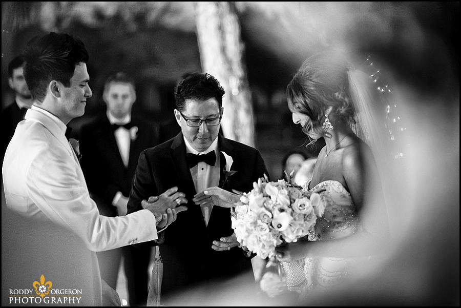 bride, groom and father pray