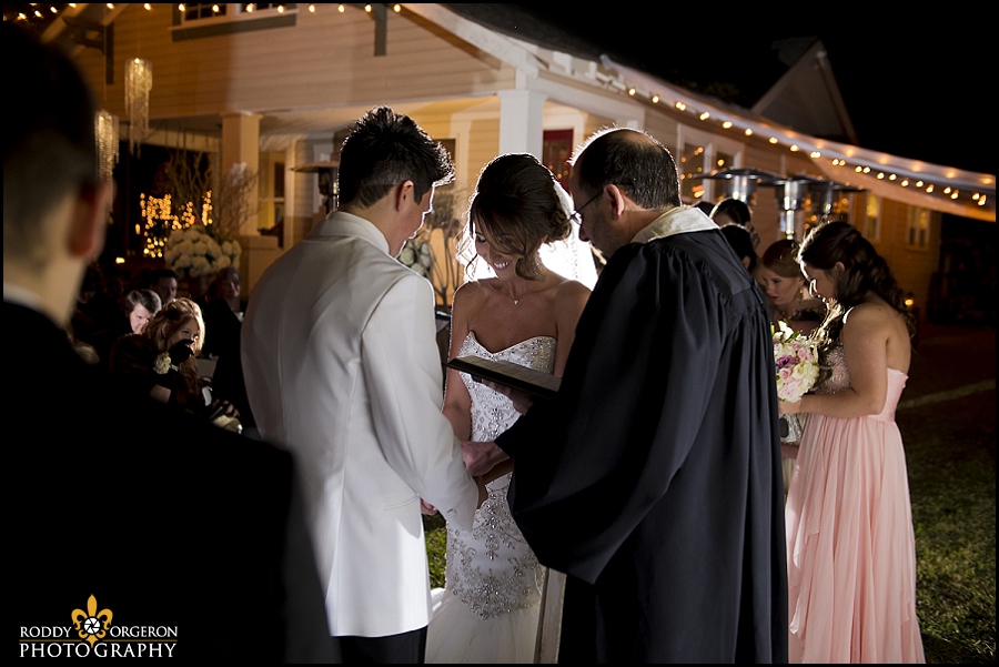 bride, groom and father pray ceremony