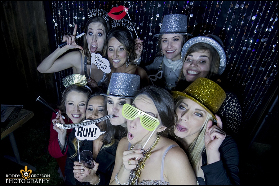 bride and friends in photobooth