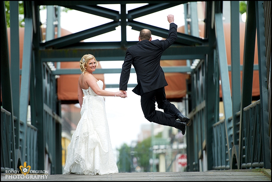 bride and groom jump