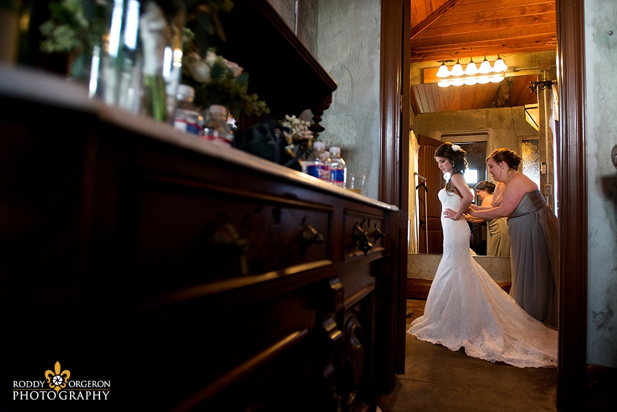 Bride getting ready at The Olde Dobbin Station in Texas