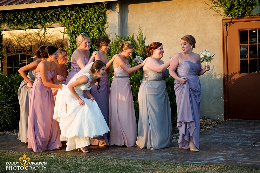 Bridemaids walking into The Olde Dobbin Station in Texas