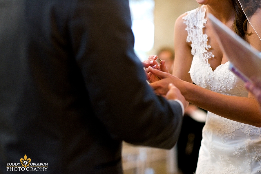 Ring exchange between bride and groom at The Olde Dobbin Station in Texas