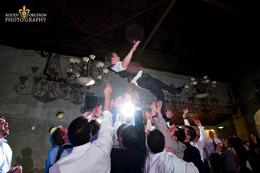 groom goes up on the dancefloor at The Olde Dobbin Station in Texas