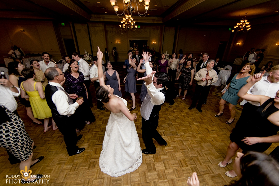 bride and groom dance to Journey at the Hampton Inn in New Orleans
