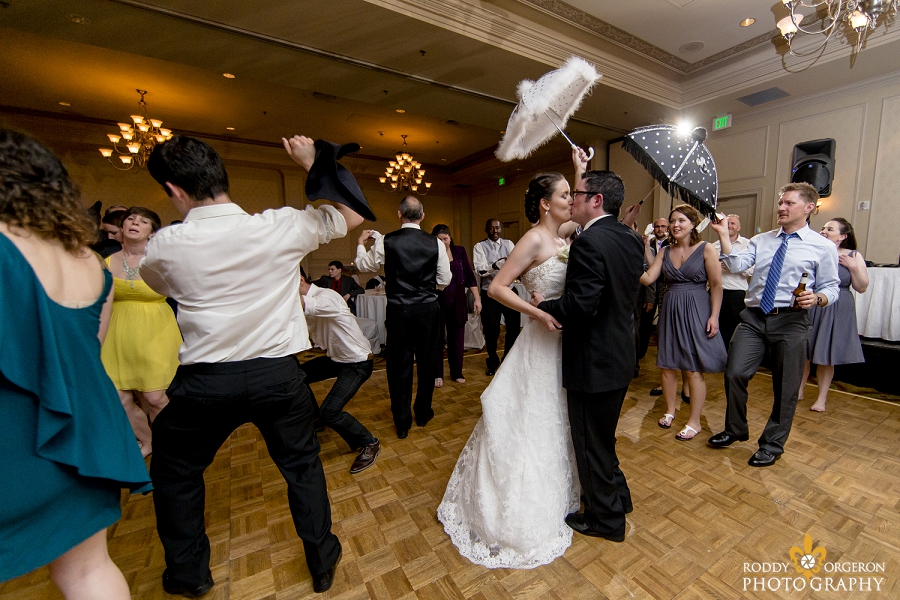 bride and groom dance to the second line at the Hampton Inn in New Orleans