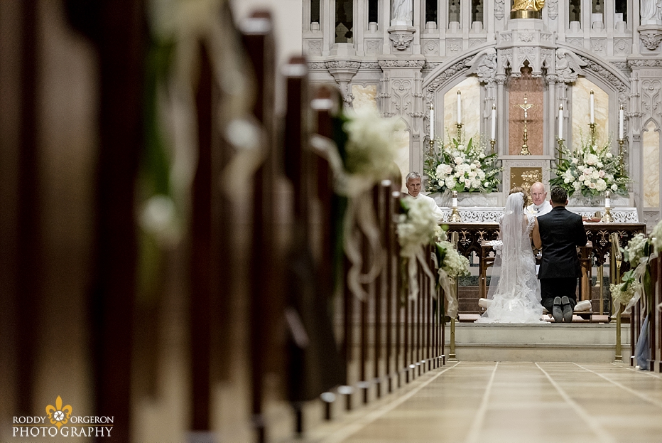 bride and groom at alter - Ursuline church in New Orleans