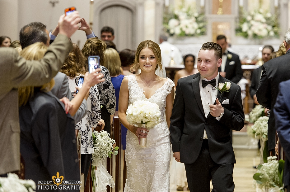 bride and groom leaving the Ursuline church in New Orleans