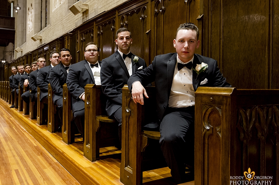 groomsmen in church waiting for ceremony to start