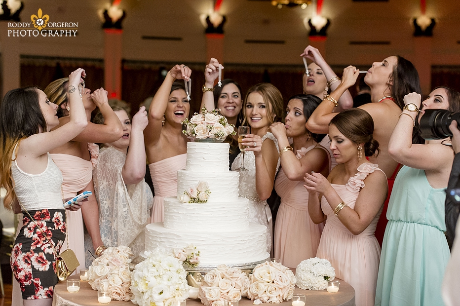 Cake pulls with bridesmaids at The Audubon Tea Room in New Orleans