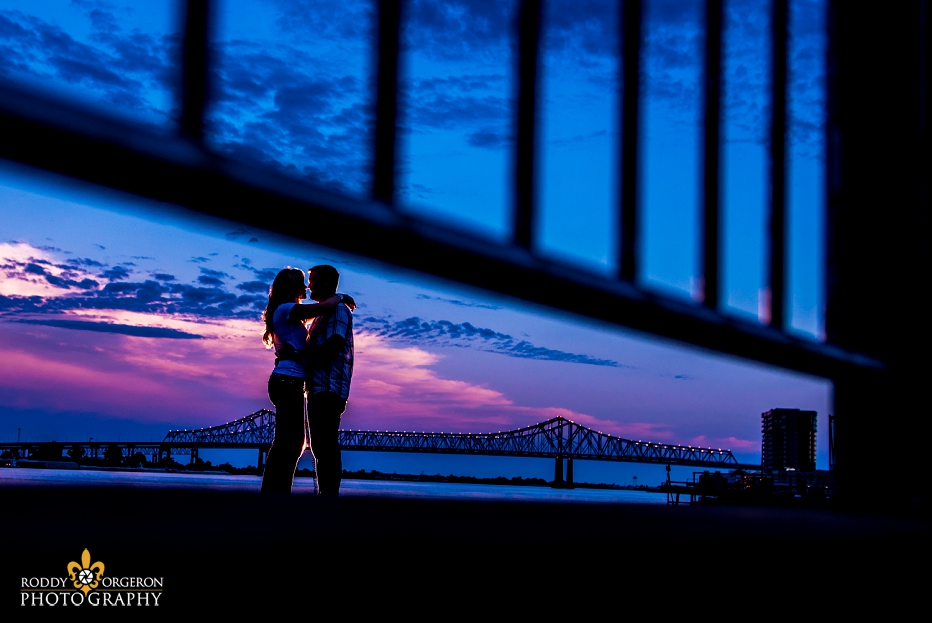Engagement session with bridge in background