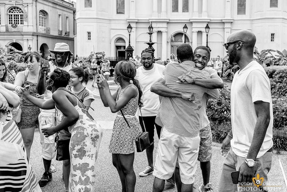 Jamal proposals to Rachel in front of the Saint Louis Cathedral in New Orleans as there friends run out and scream surprise!