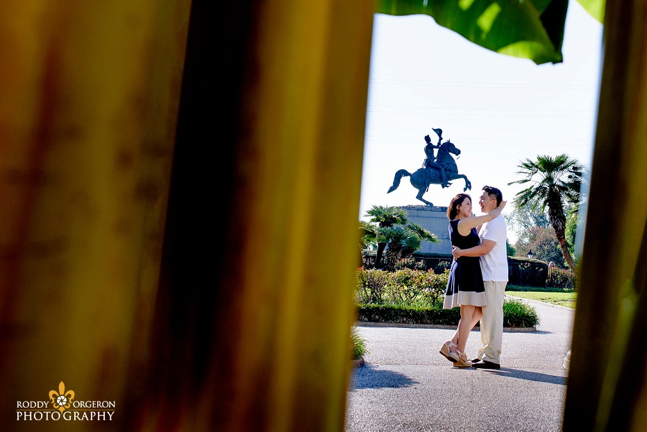 Saint Louis Cathedral Engagement session by statue