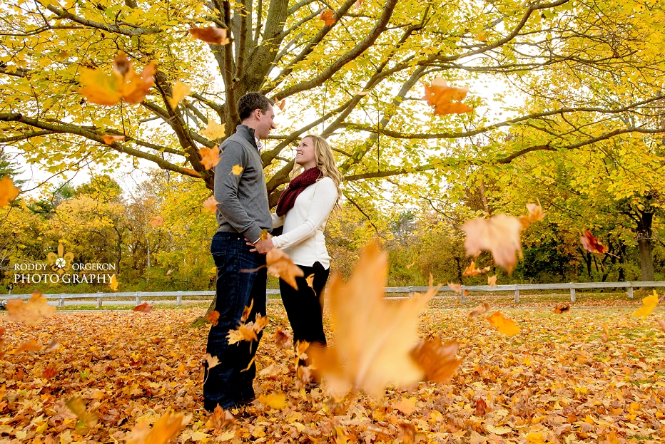 Engagement session leaves blowing