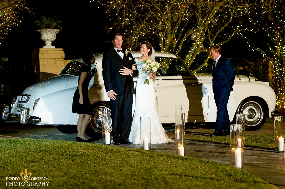 bride and her father getting out of a Rolls Royce to walk down the aisle at Southern Oaks Plantation