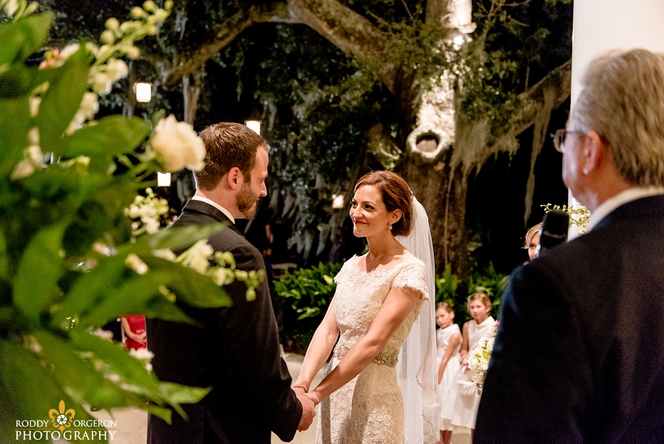 Bride and groom saying vows at Southern Oaks Plantation