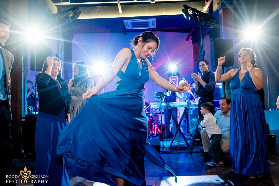 bridesmaid dancing at The Chicory wedding venue in New Orleans