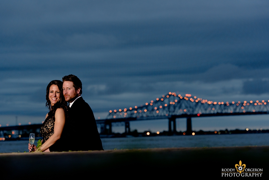 Bride and Groom Engagement Session in New Orleans with the bridge in the background