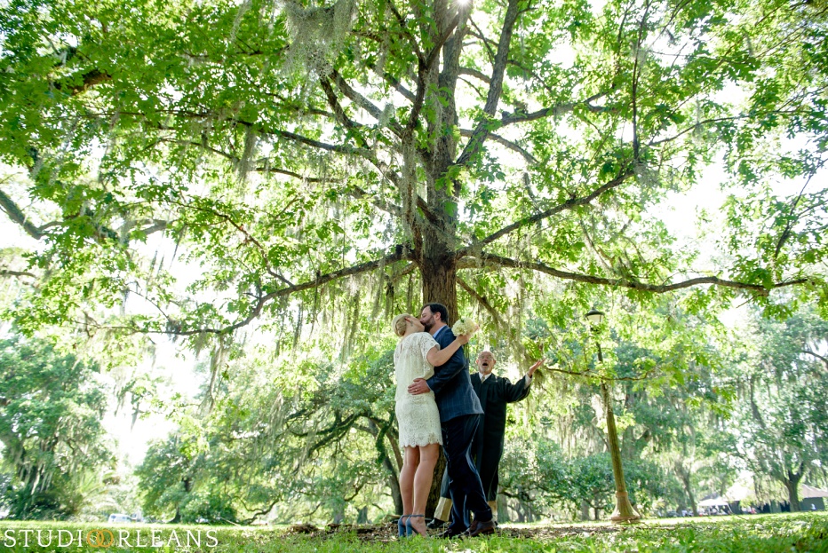Elopement in City Park New Orleans first kiss under the oak trees