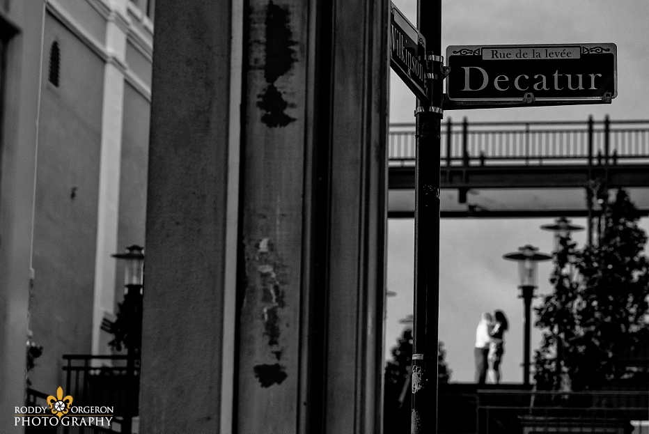 Engagement Session in New Orleans with Decatur sign in the background