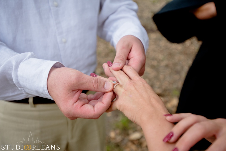 City Park Elopement ring exchange between and bride and groom