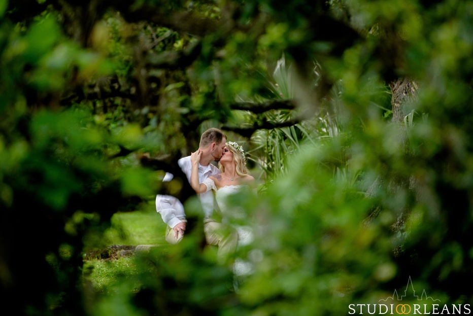 City Park Elopement - bride and groom kissing under the oak trees
