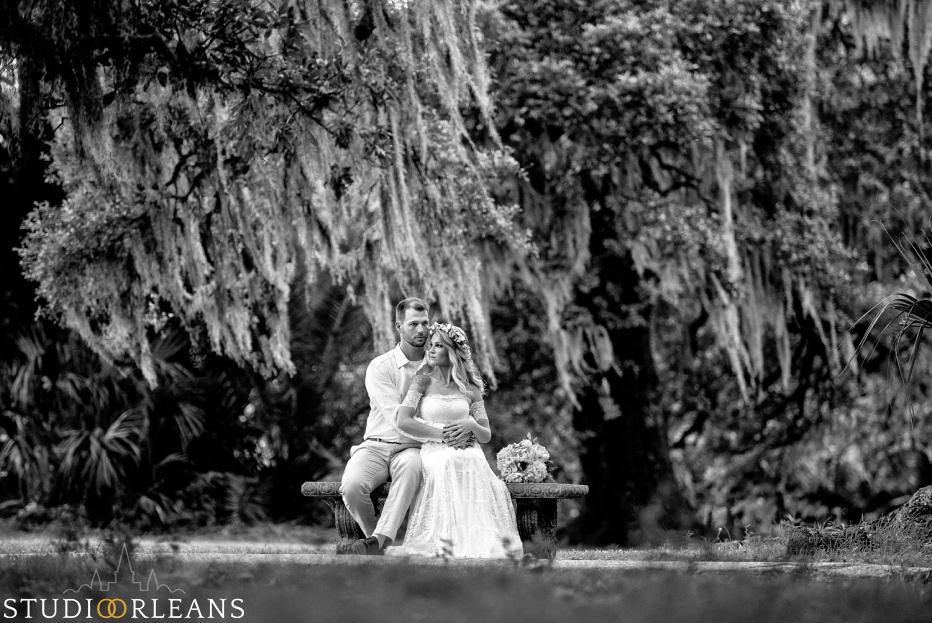  City Park Elopement - bride and groom posing under the oak trees