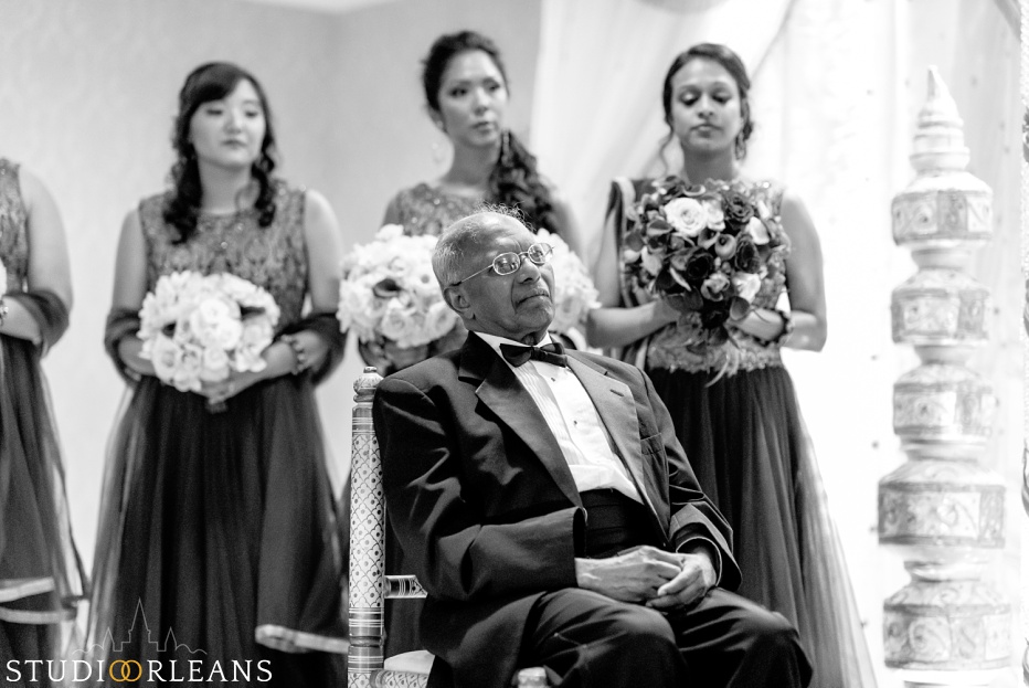 Indian wedding ceremony at the Roosevelt hotel in New Orleans - father watching bride and groom