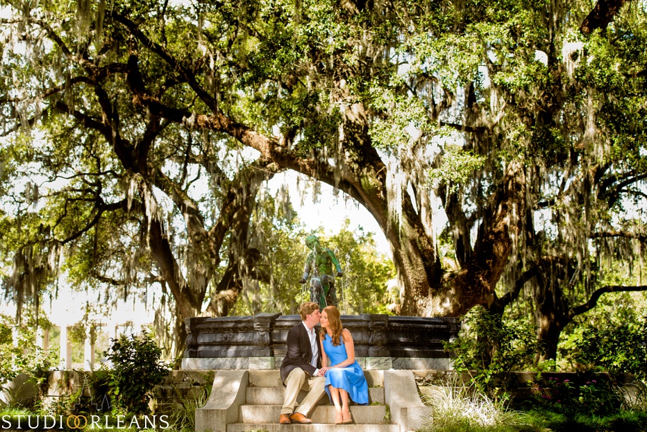 Engagement Session in City Park by the beautiful fountain with Oak trees in the background