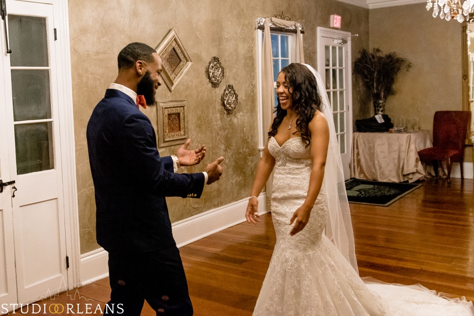 The groom gets ready for the first look at his bride. This was taken at Cedar Grove Plantation. Photo by Studio Orleans New Orleans Photographers