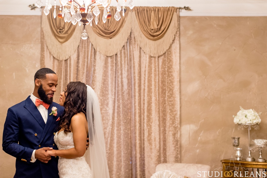 The groom sees his bride for the first time. This was taken at Cedar Grove Plantation. Photo by Studio Orleans New Orleans Photographers
