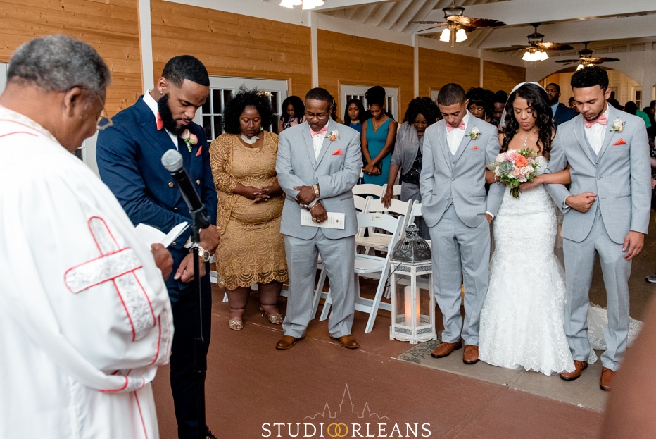 Everyone prays before the ceremony starts. This was taken at Cedar Grove Plantation. Photo by Studio Orleans New Orleans Photographers