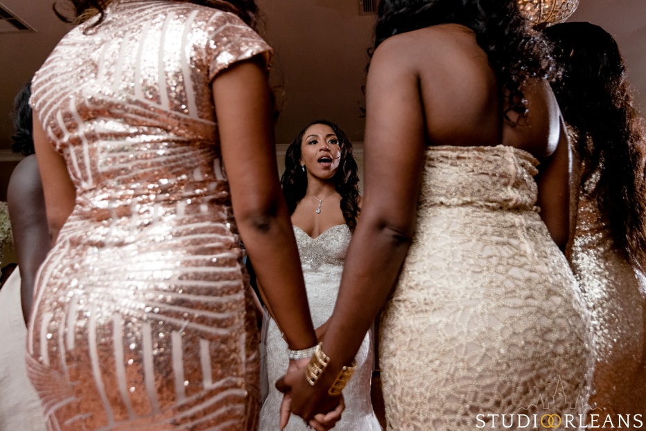 The bride sings and joked with her friends at Cedar Grove Plantation. Photo by Studio Orleans New Orleans Photographers