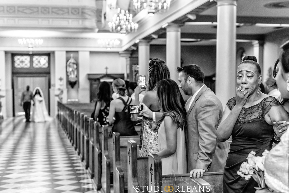 A bride walking into the Saint Louis Cathedral 