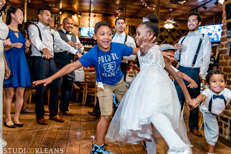 Kids dancing at a wedding at Oceana Grill in the French Quarter of New Orleans. An Oceana Grill Wedding