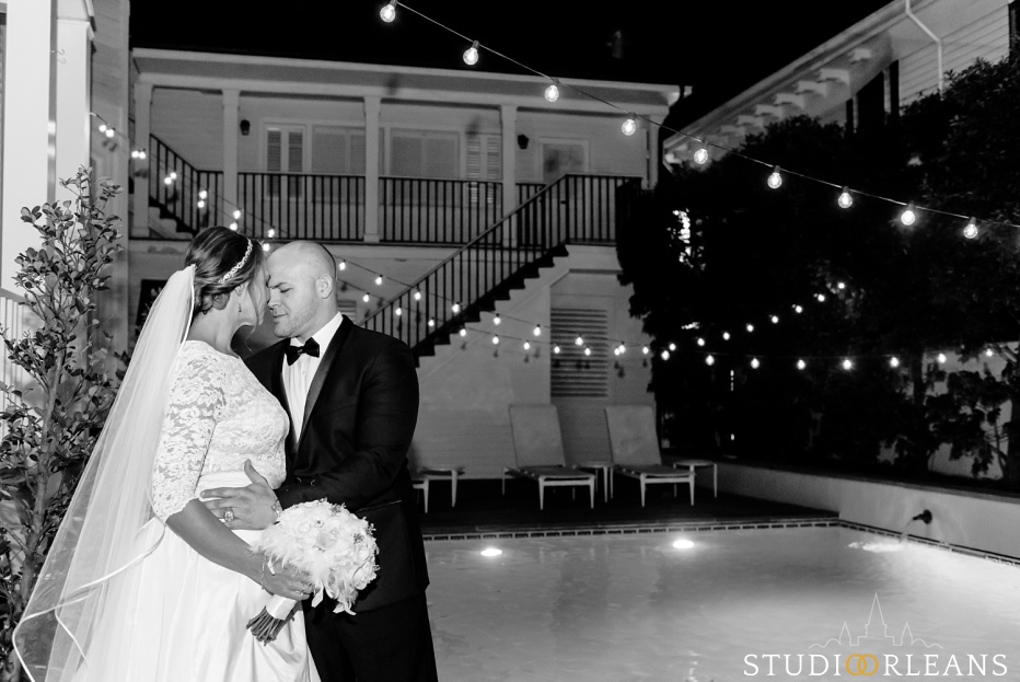 A bride and groom have a "first look" in a New Orleans courtyard