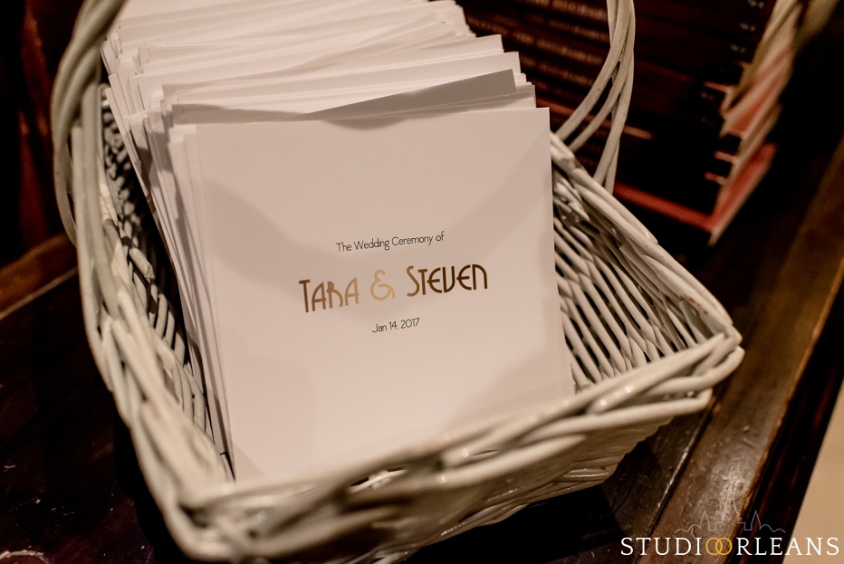 The wedding itinerary in a basket at church before the ceremony