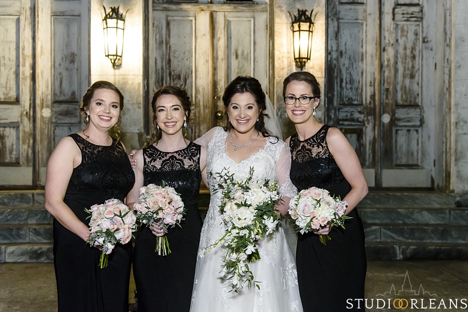 The bride and her bridesmaids waiting for her wedding at the Marigny Opera house in New Orleans